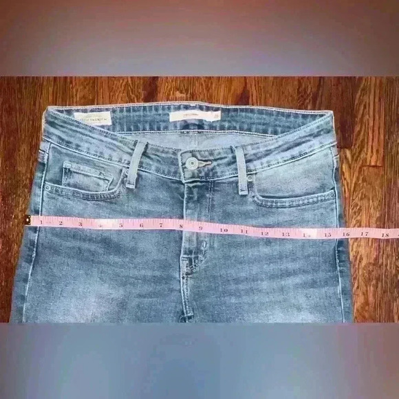 LEVIS Premium 711 Mid Rise Skinny Jean with Raw Hem in Light Wash - Picture 5 of 13